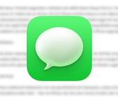 Das Symbol der Apple-Anwendung «Nachrichten» vor einem verschwommenen, längeren Text