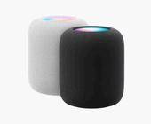 Zwei Apple Homepods, einmal in Weiss, einmal in Schwarz