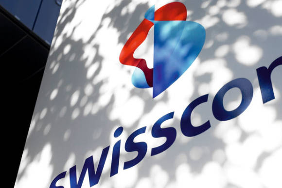 Swisscom-Logo an einer Wand 