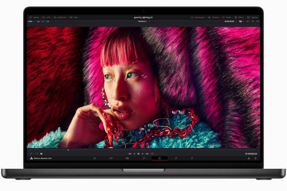 MacBook Pro mit einer Fotografie auf dem Bildschirm MacBook Pro mit einer Fotografie auf dem Bildschirm
