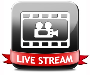 Kamera und rotes Banner auf dem Live Streaming steht 