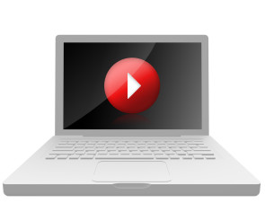 Laptop mit Play-Button 