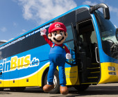Super Mario fährt mit dem Fernbus