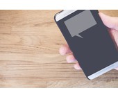 Smartphone mit Sprechblase
